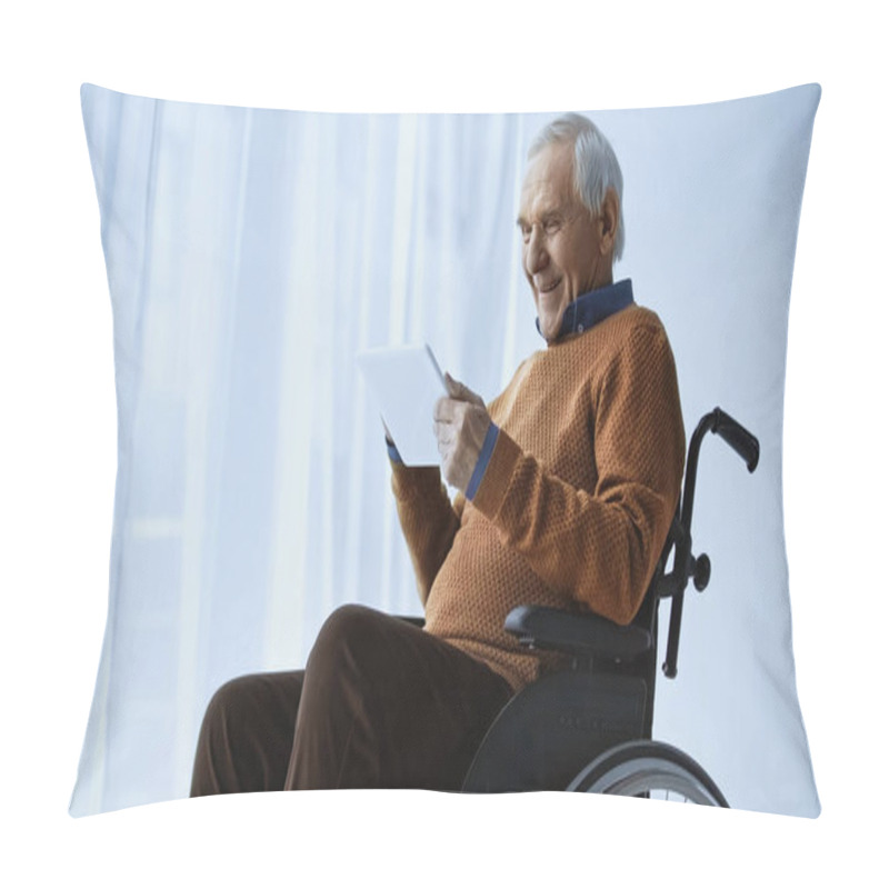 Personality  Smiling Elderly Man In Wheelchair Looking At Tablet In Hands At Retirement Home Pillow Covers