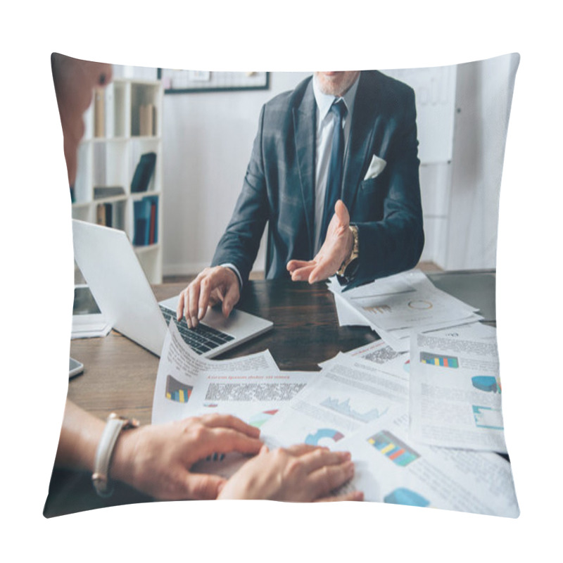 Personality  Cropped View Of Investor Using Laptop And Pointing With Hand Near Businesswoman With Papers On Blurred Foreground  Pillow Covers