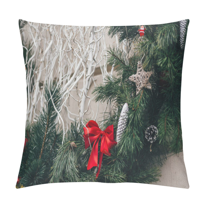 Personality  Stylish Christmas Decorations, Green Christmas Wreath With Red Bows And Ornaments, Pine Cones, Stars, White Branches In European City Street. Festive Decor In City Center, Winter Holidays Pillow Covers