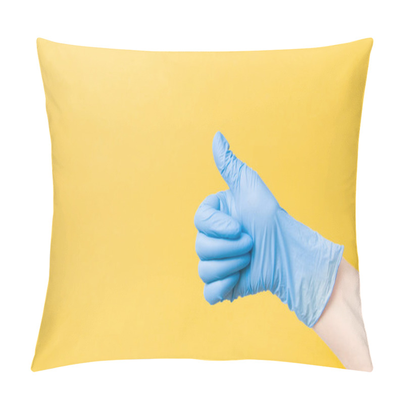 Personality  Hand In A Blue Disposable Medical Glove With A Raised Thumb Up On A Yellow Background Copy Space, Ok Sign, Approval Gesture And Like Sign Concept Pillow Covers