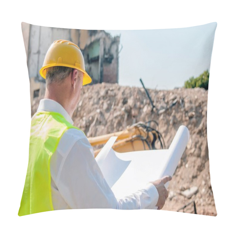 Personality  Civil Engineer Working With Documents On Construction Site. Construction Engineer In Yellow Hardhat Inspecting Blueprints On Building Site Pillow Covers