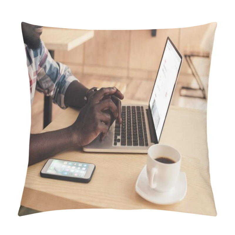 Personality  Cropped View Of African American Man Using Laptop With Airbnb Website  And Smartphone In Coffee Shop Pillow Covers