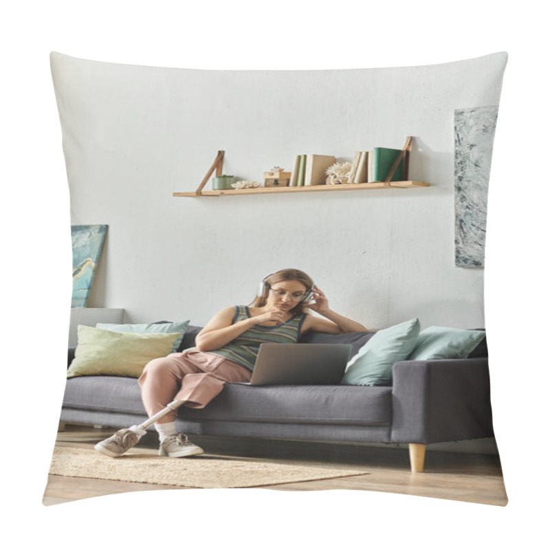 Personality  A Young Woman With A Prosthetic Leg Sits On A Couch In Her Living Room, Wearing Headphones And Using A Laptop. Pillow Covers