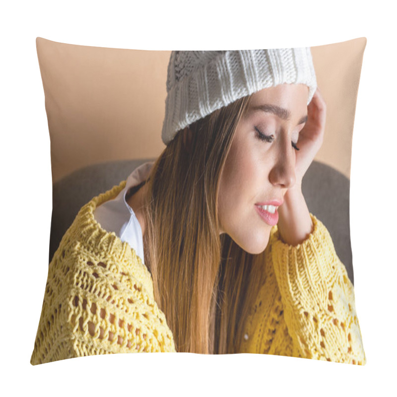 Personality  Attractive Tender Girl With Closed Eyes In Yellow Sweater And Hat Sitting In Armchair On Beige Pillow Covers