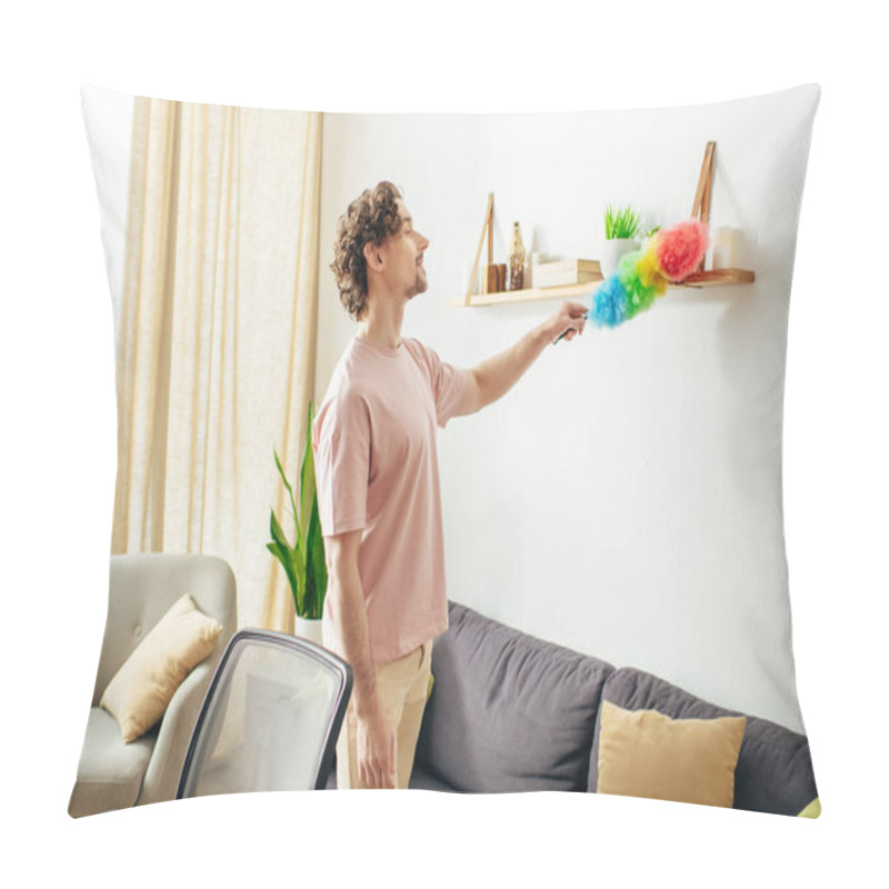 Personality  A Handsome Man In Cozy Homewear Cleaning A Living Room With A Duster. Pillow Covers