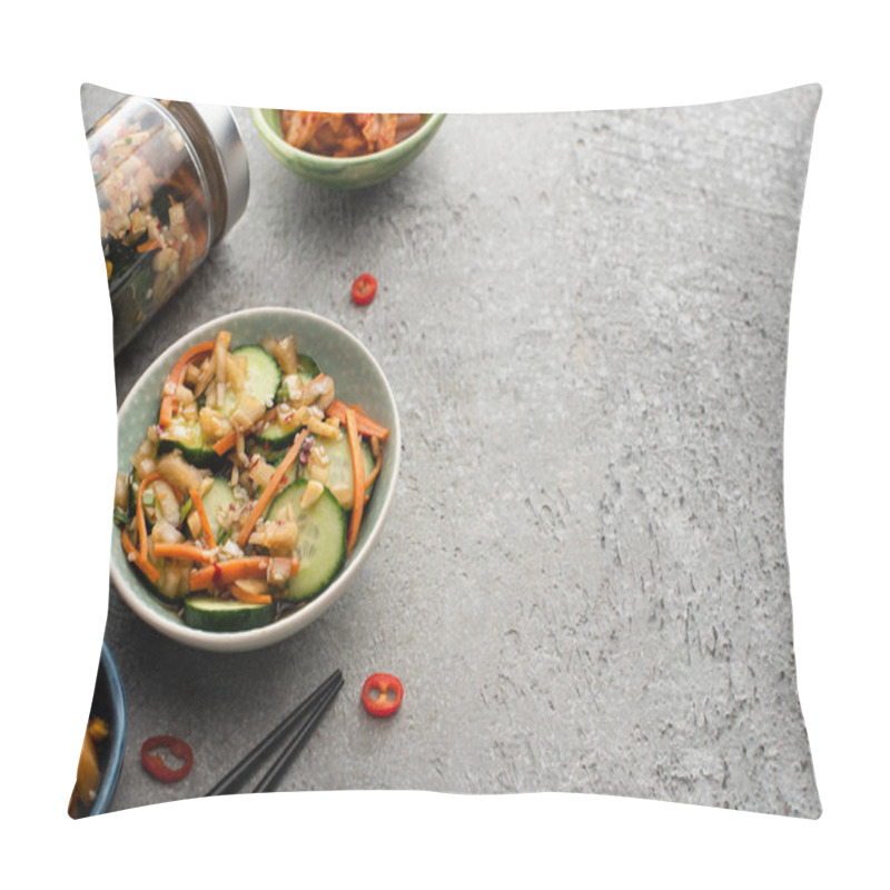 Personality  Tasty Kimchi In Bowls And Jars Near Chopsticks On Concrete Surface Pillow Covers