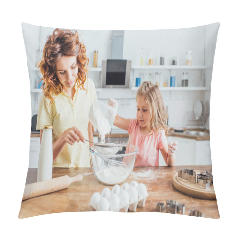 Personality  Selective Focus Of Young Curly Woman With Daughter Sieving Flour Into Glass Bowl Near Ingredients And Cookie Cutters On Table Pillow Covers