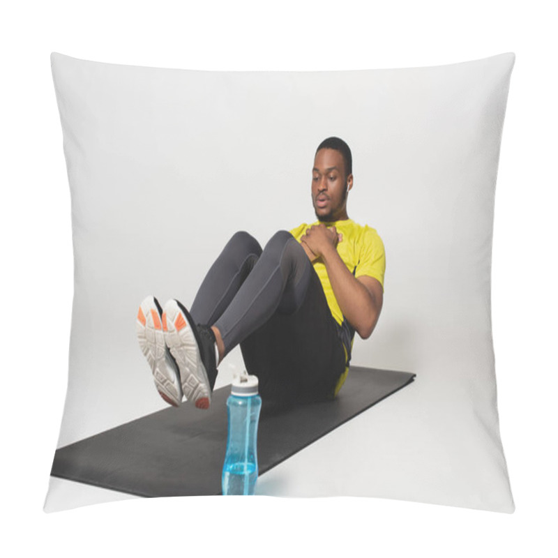 Personality  Full Length Of Sportive African American Man In Earphones Doing Abs Exercise On Fitness Mat Near Sports Bottle On Grey Pillow Covers