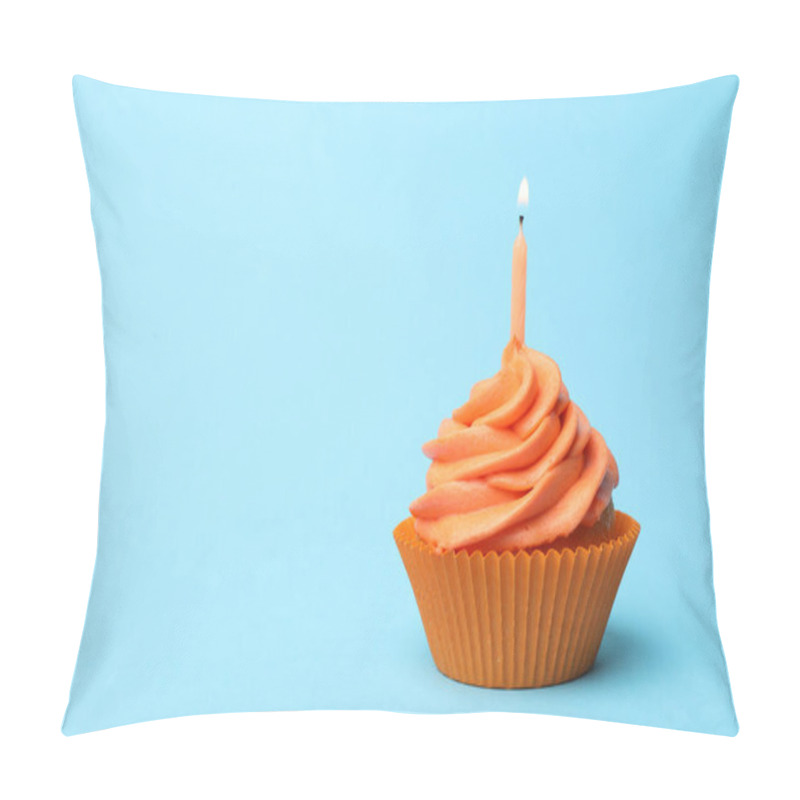 Personality  Delicious Birthday Cupcake With Orange Cream And Burning Candle On Light Blue Background. Space For Text Pillow Covers