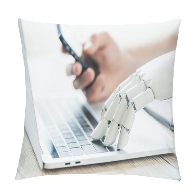 Personality  Close-up View Of Human And Robot Hands Using Smartphone And Laptop At Wooden Table Pillow Covers