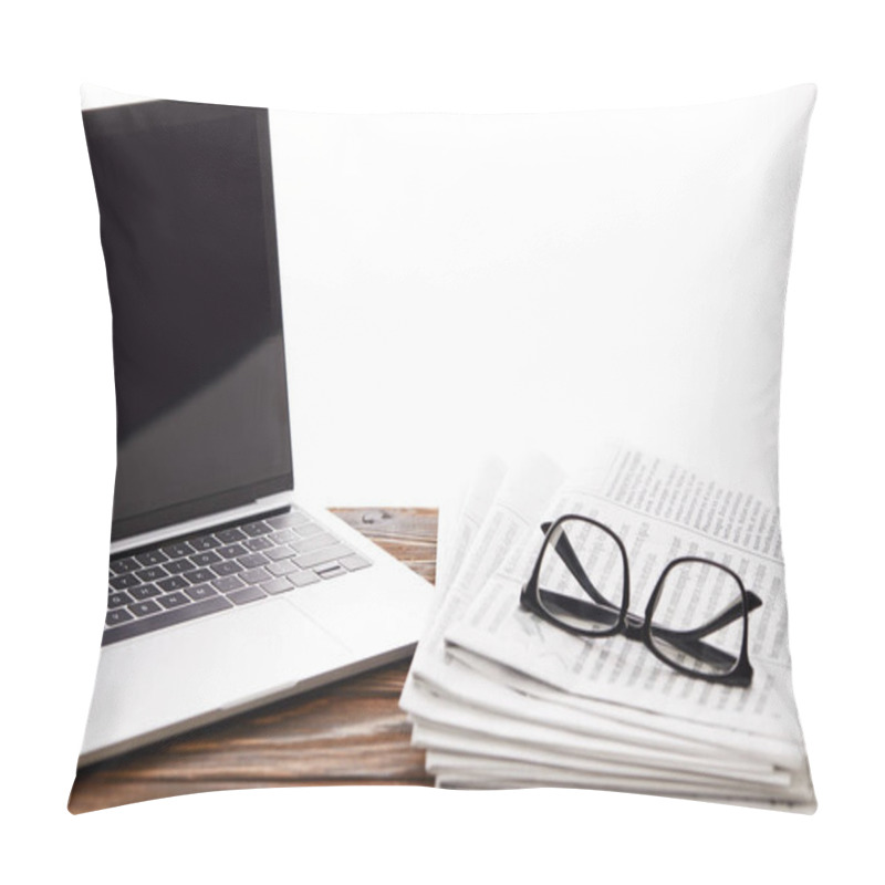 Personality  Eyeglasses On Newspapers And Laptop With Blank Screen On Wooden Surface, On White Pillow Covers