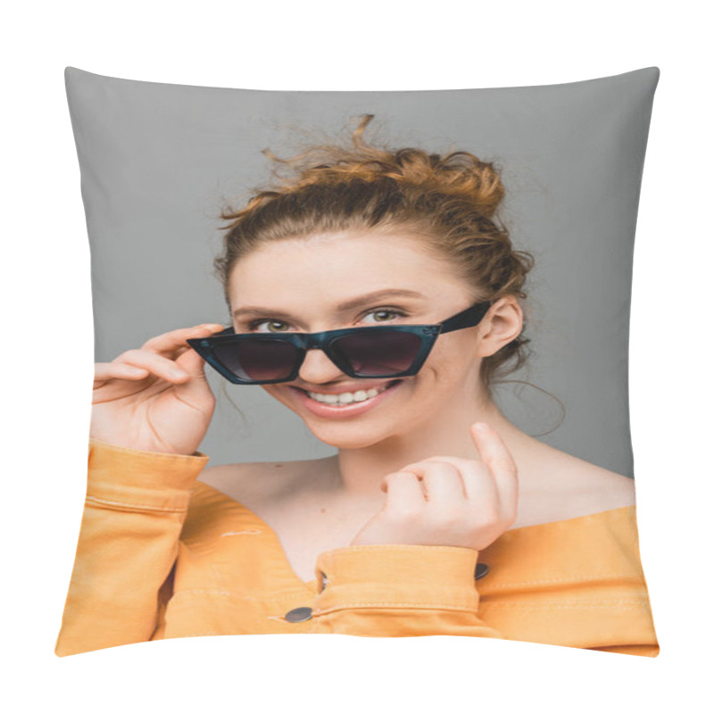 Personality  Cheerful Young Redhead Woman With Natural Makeup Touching Sunglasses And Wearing Orange Denim Jacket While Standing Isolated On Grey Background, Trendy Sun Protection Concept, Fashion Model  Pillow Covers