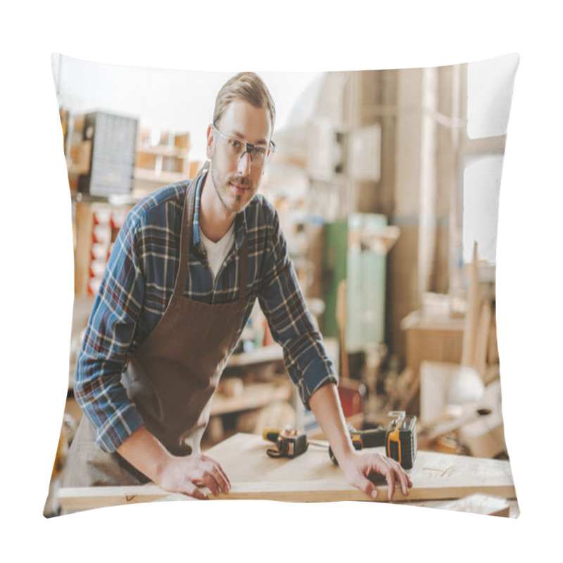 Personality  Selective Focus Of Handsome Carpenter In Goggles Standing Near Wooden Plank On Table  Pillow Covers