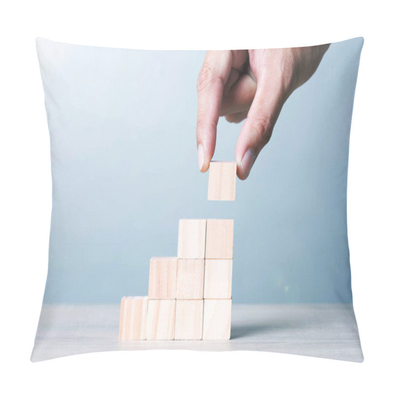 Personality  Wood Block Cubic Stack With Hand On Table Blue Tone Background. Free Copy Space. Pillow Covers