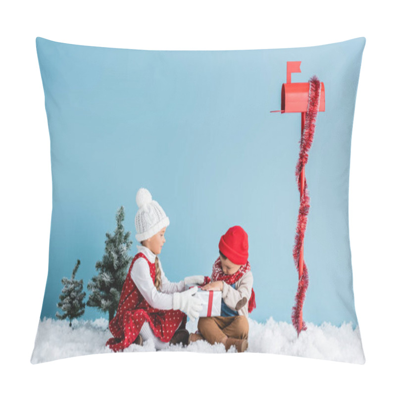 Personality  Kids In Winter Outfit Sitting On Snow And Touching Present Near Mailbox On Blue Pillow Covers