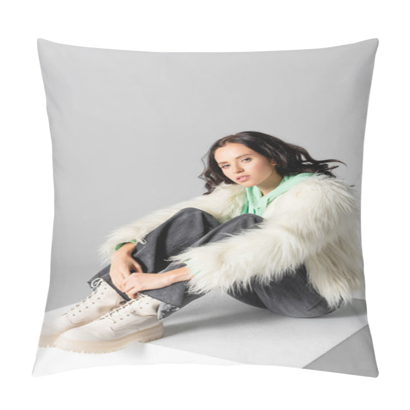 Personality  Brunette Young Woman In Faux Fur Jacket Posing On Cube On White Background Pillow Covers