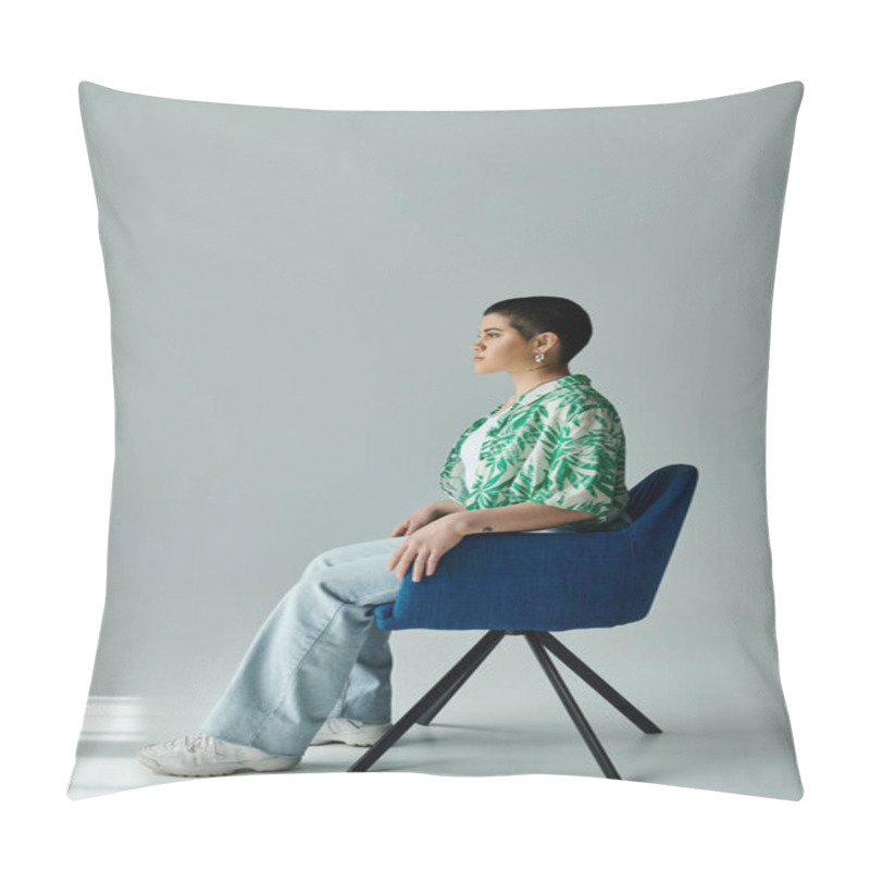 Personality  A Young Woman With Short Hair Sits On A Blue Chair, In A Serene Pose. Pillow Covers