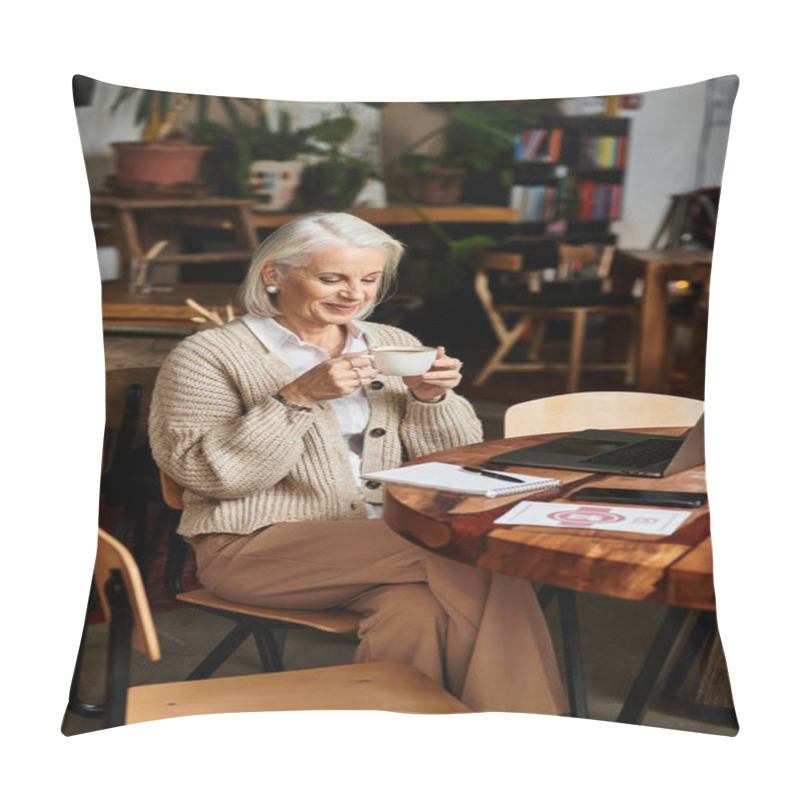 Personality  A Beautiful Mature Woman With Gray Hair Savors A Drink, Immersed In Her Work At A Cafe. Pillow Covers