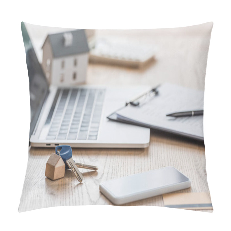 Personality  Selective Focus Of Keys Near Laptop, Smartphone, Clipboard And House Model On Wooden Table Pillow Covers