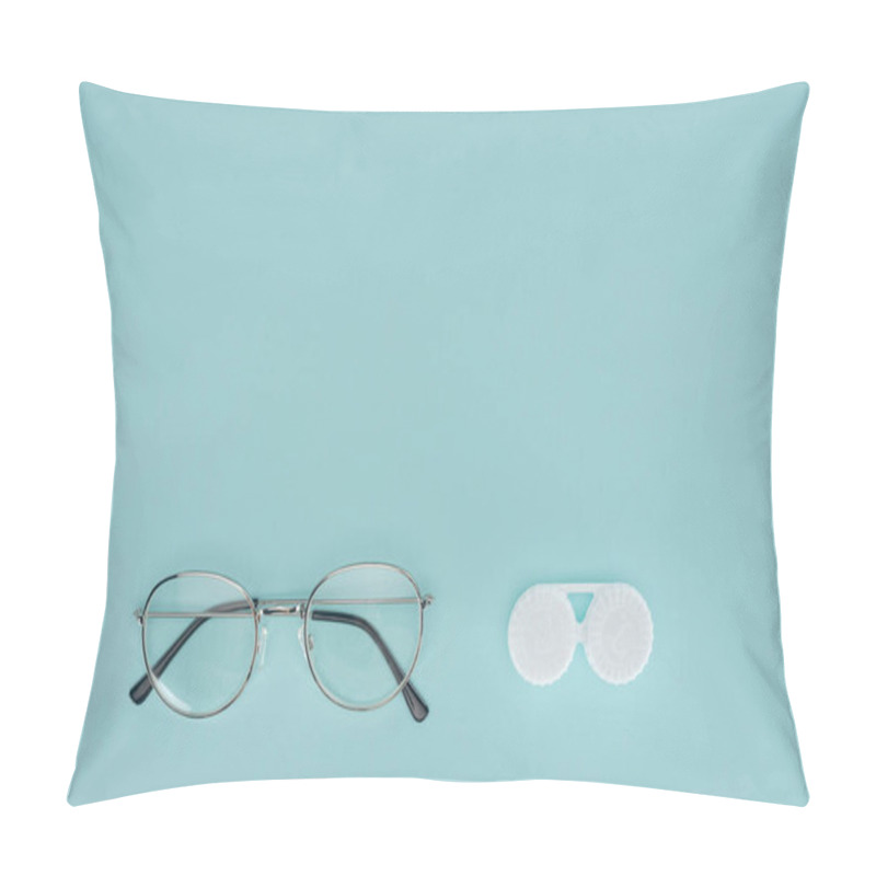 Personality  Top View Of Eyeglasses And Contact Lenses Container On Blue Background Pillow Covers