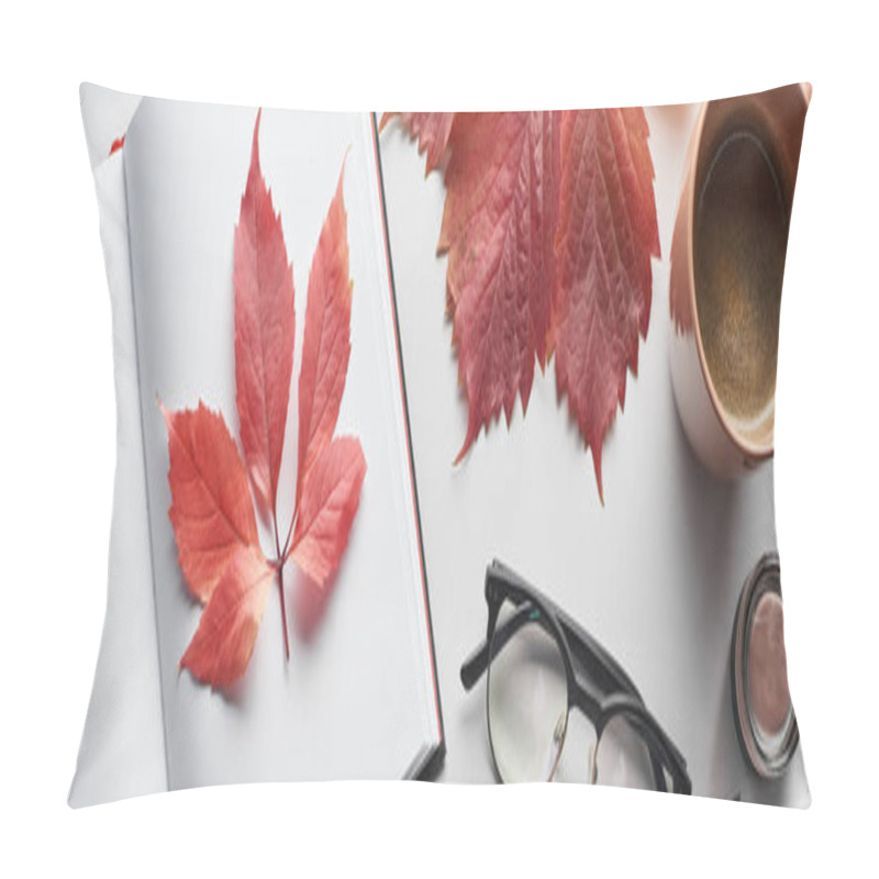 Personality  Panoramic Shot Of Notebook Near Red Leaves Of Wild Grapes, Cup Of Coffee, Glasses And Container With Blush On White Table Pillow Covers