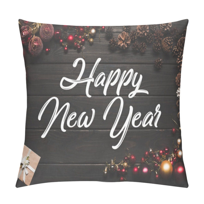 Personality  Top View Of Arranged Shiny Christmas Balls, Pine Cones And Gift Card On Wooden Surface, Happy New Year Inscription Pillow Covers