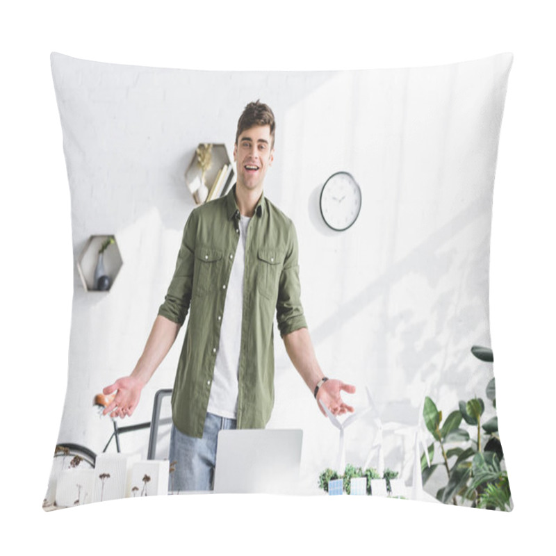 Personality  Handsome Architect Standing And Smiling Near Table With Trees, Buildings And Windmills Models On Grass In Office Pillow Covers