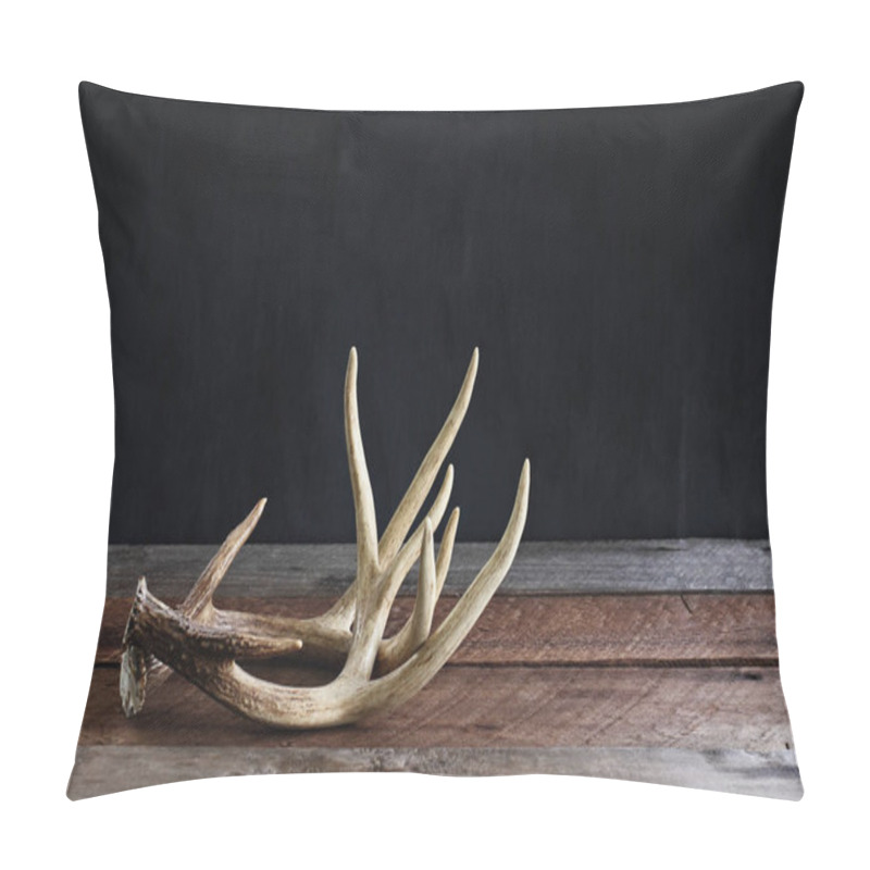 Personality  A Pair Of Real White Tail Deer Antlers Over A Rustic Wooden Table Against A Black Background Used By Hunters When Hunting To Rattle In Other Large Bucks. Free Space For Text. Pillow Covers