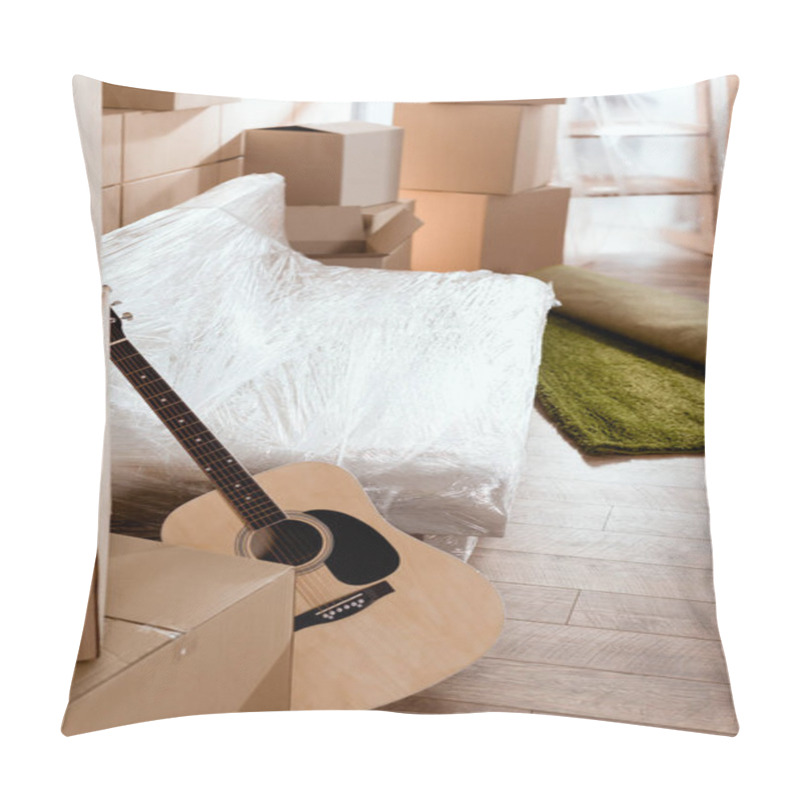 Personality  Sofa, Acoustic Guitar, Rolled Carpet And Cardboard Boxes In New Home Pillow Covers