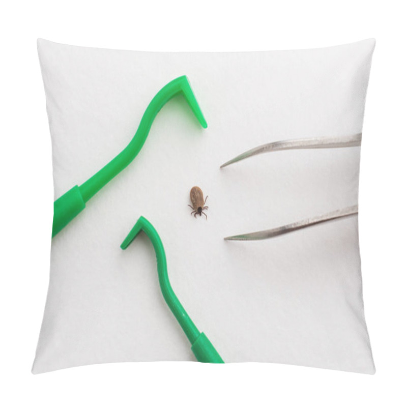 Personality  Tool For Pulling Out The Tick Lying On A White Background, Dangerous, Blood-sucking Insect, Grey Tick Full Of Blood Located Between The Blades And Tweezers For Pulling Out Ticks Pillow Covers