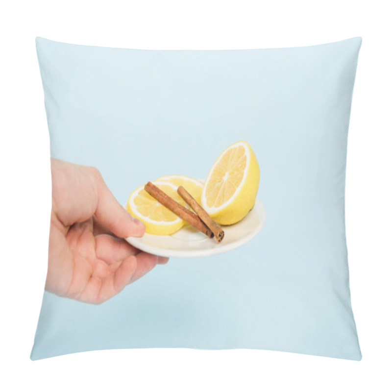 Personality  Cropped View Of Man Holding Plate With Sliced Lemons And Cinnamon Sticks Isolated On Blue  Pillow Covers