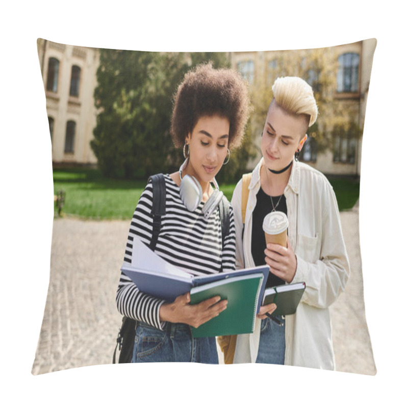 Personality  Two Young Women Standing In A Courtyard, Engrossed In A Book As They Explore Its Contents Together. Pillow Covers