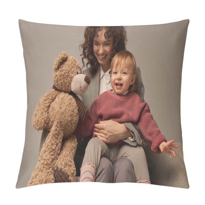 Personality  Quality Family Time, Parenting And Career, Cheerful Businesswoman Holding Teddy Bear Near Toddler Daughter On Grey Background, Sitting On Armchair, Work Life Harmony Concept  Pillow Covers