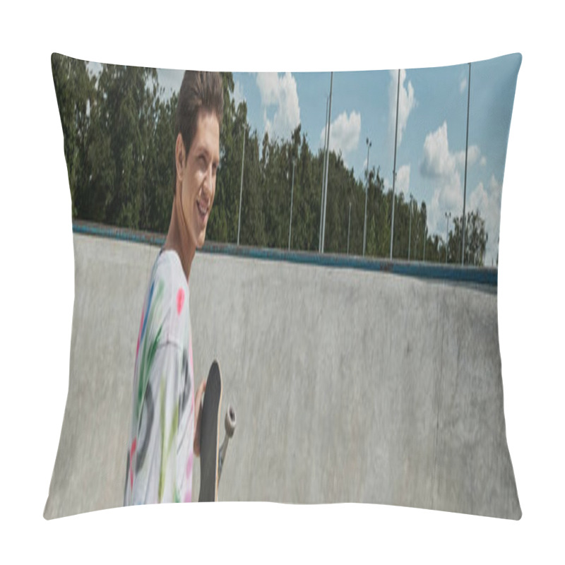 Personality  A Youthful Man Adorned In A Vibrant Shirt Joyfully Holds A Skateboard In A Bustling Skate Park On A Sunny Day. Pillow Covers