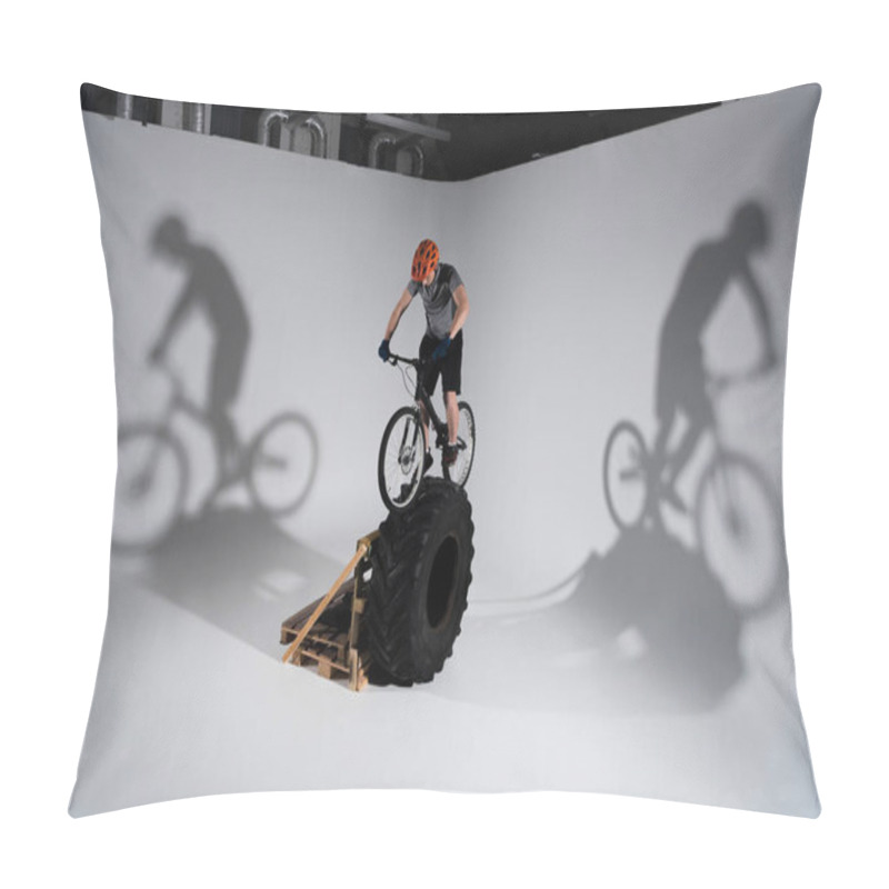 Personality  Young Trial Biker In Helmet Balancing On Tractor Wheel Pillow Covers