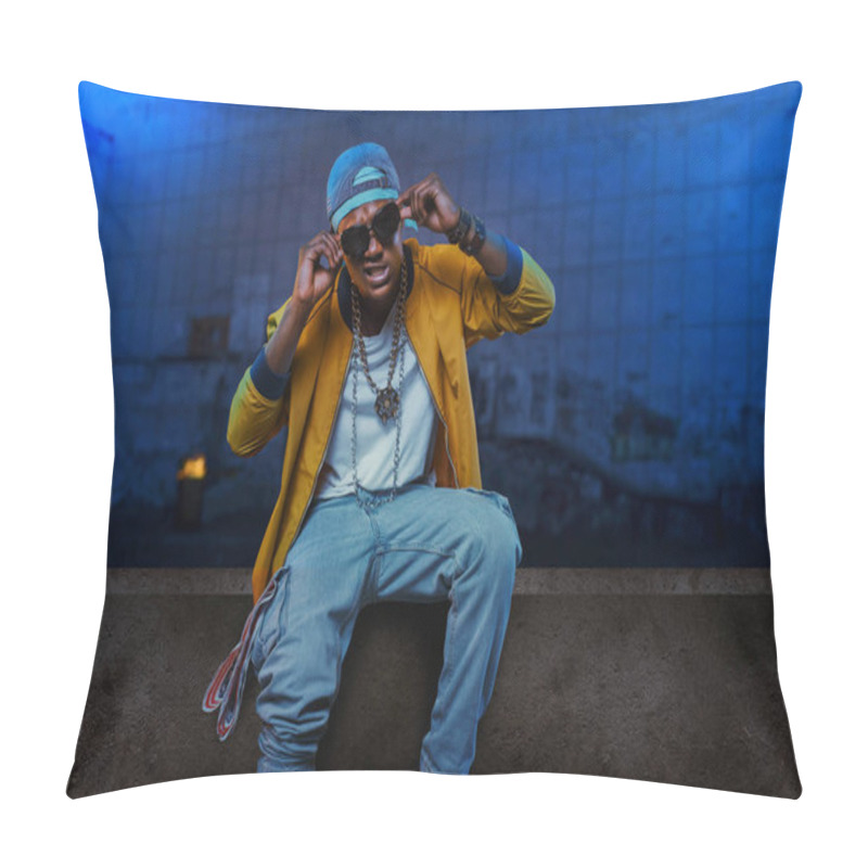 Personality  Black Rapper In Cap And Sunglasses Poses In Underpass, Singer In Grunge Subway. Rap Performer On Scene With Lights, Underground Music, Urban Style Pillow Covers