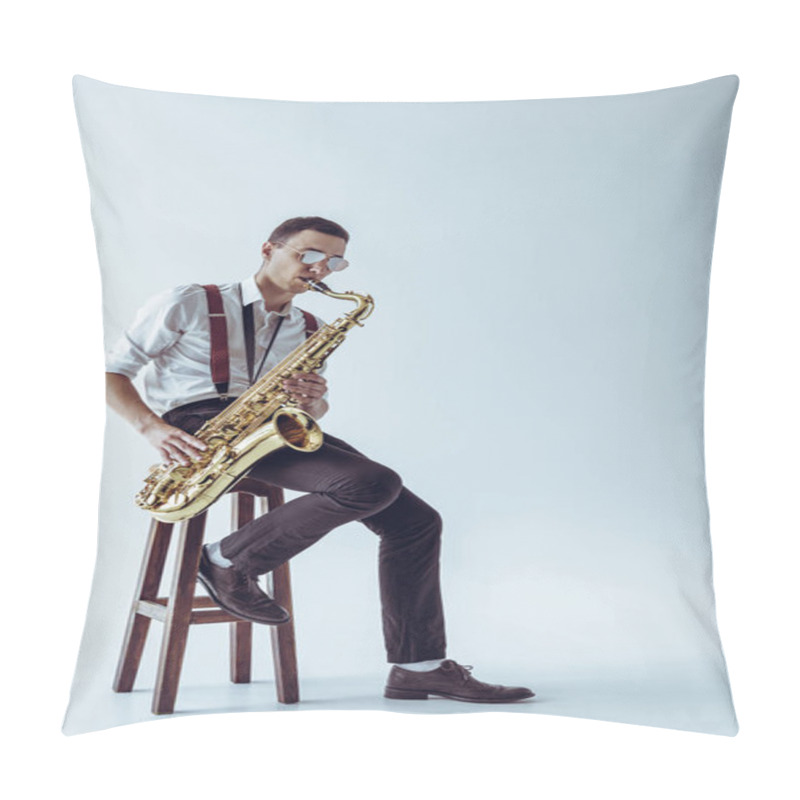 Personality  Handsome Young Performer Sitting On Stool And Playing Saxophone On Grey  Pillow Covers