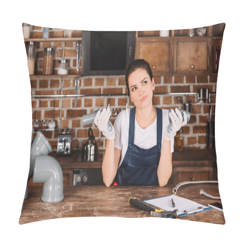 Personality  Thoughtful Young Female Plumber With Plastic Pipes At Kitchen Pillow Covers