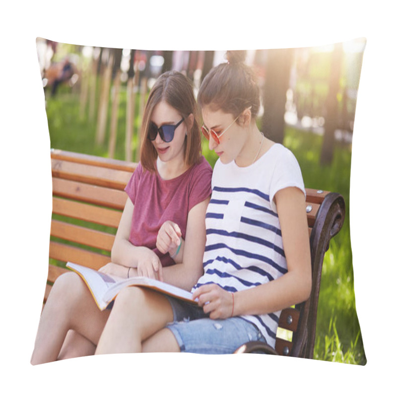 Personality  Thoughtful Two Girls Wear Casual Clothes, Sit On Wooden Bench In Park And Talk About News Described In Latest Magazine, Read Funny Things. Bosom Friends Are Fond Of Reading And Talking Together. Pillow Covers