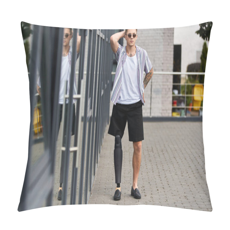 Personality  Handsome Young Man With A Prosthetic Leg Poses Confidently Near Modern Glass Architecture. Pillow Covers