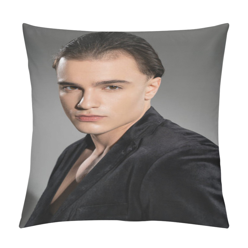 Personality  Portrait Of Young And Stylish Man With Confident Face Expression And Brunette Hair Looking At Camera While Posing In Black Silk Blazer On Grey Background Pillow Covers