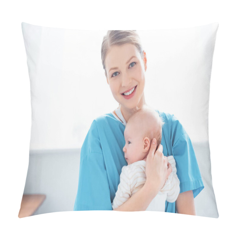 Personality  Happy Young Mother Holding Newborn Baby And Smiling At Camera In Hospital Room Pillow Covers