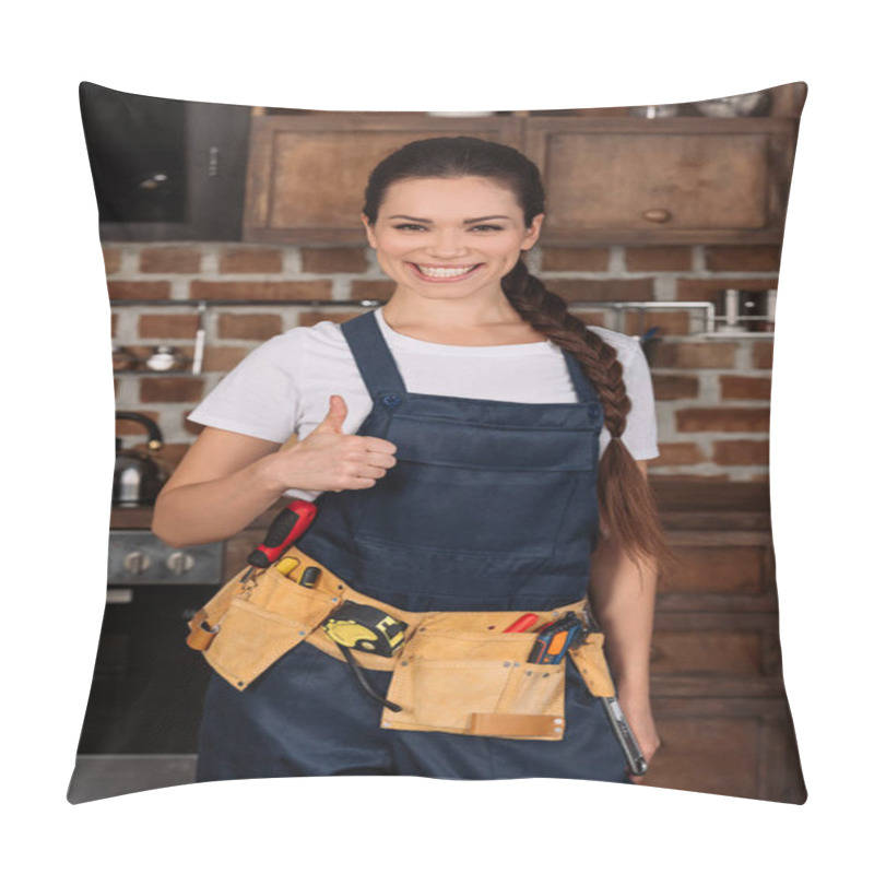 Personality  Smiling Young Repairwoman Standing At Kitchen And Showing Thumb Up Pillow Covers