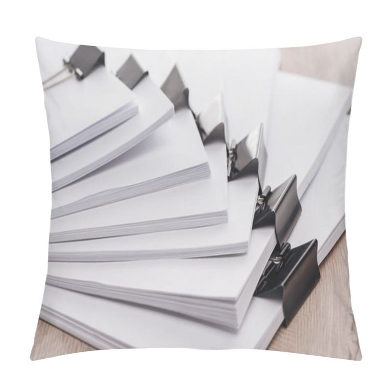 Personality  Arranged Stacks Of Blank Paper With Metal Binder Clips On Wooden Desk Pillow Covers