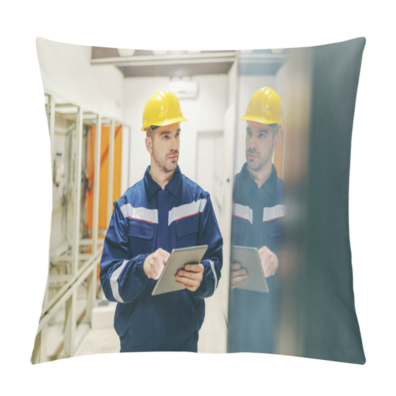 Personality  Electrician In Uniform And Helmet On Head Using Tablet And Checking On Dashboard In Control Room In Heavy Industry Plant. Pillow Covers