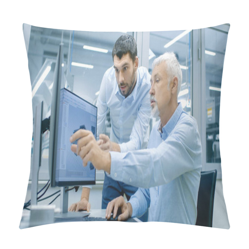 Personality  Industrial Designer Has Conversation With Senior Engineer While Working In CAD Program, Designing New Component. He Works On Personal Computer With Two Monitors. Pillow Covers