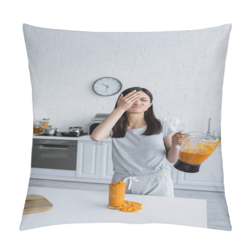 Personality  Displeased Asian Woman Covering Face With Hand While Holding Jar Of Smoothie Near Overflowing Glass Pillow Covers