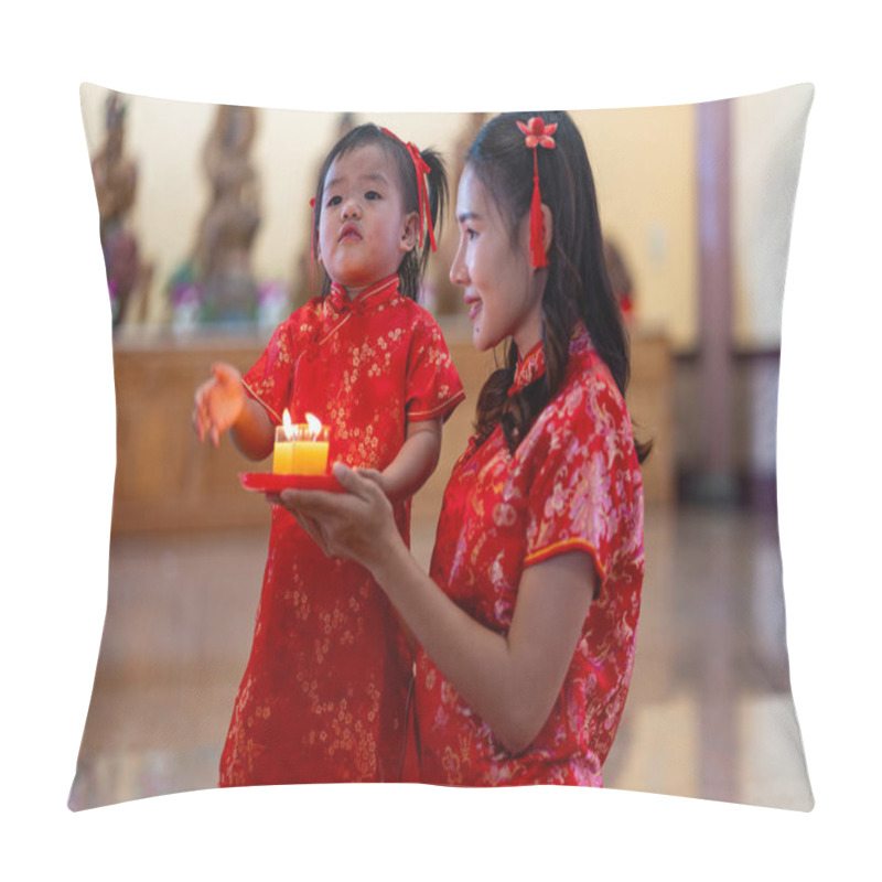 Personality  Young Mother And Little Daughter In Traditional Red Cheongsam Kneels In Prayer, Holding Lit Candles In Temple On Chinese New Year. Spiritual, Cultural Significance Of Lunar New Year Celebrations Pillow Covers