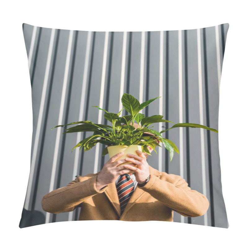 Personality  Man With Obscure Face Holding Green Plant In Pot Near Wall Pillow Covers