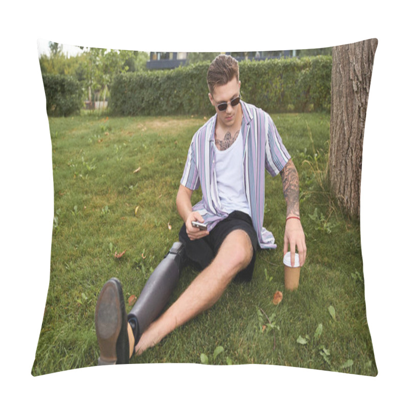 Personality  Handsome Young Man Sits Comfortably On Grass, Enjoying Iced Coffee In A Peaceful Park Setting. Pillow Covers